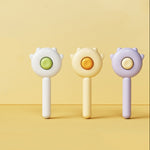 PETXIMA pet grooming brush in green yellow and purple colors